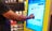 Entering card PIN into the exchange kiosk