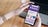 woman using Smartphone opening Giftcards.com on mobile